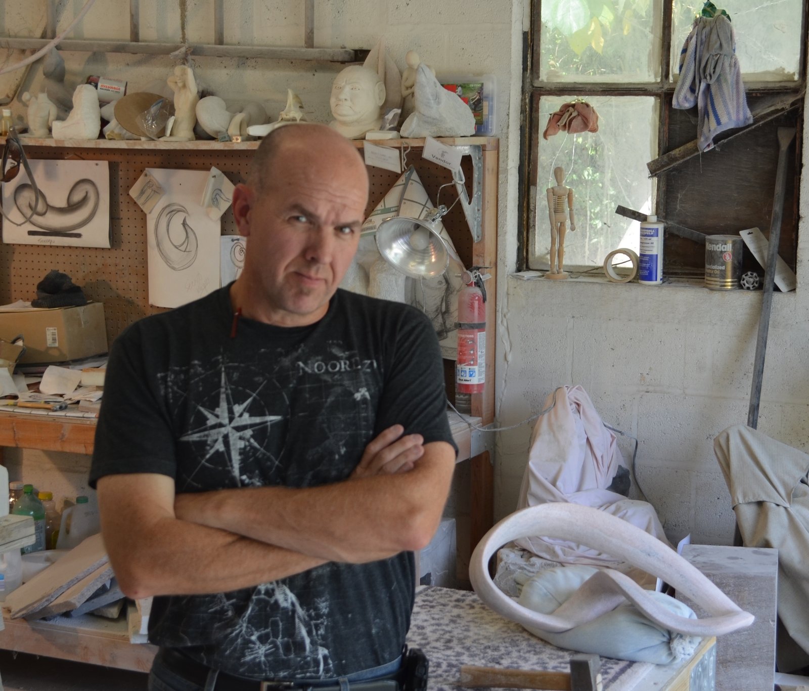 Image of Knoxville stone sculptor Bill Cook Jr. in his studio