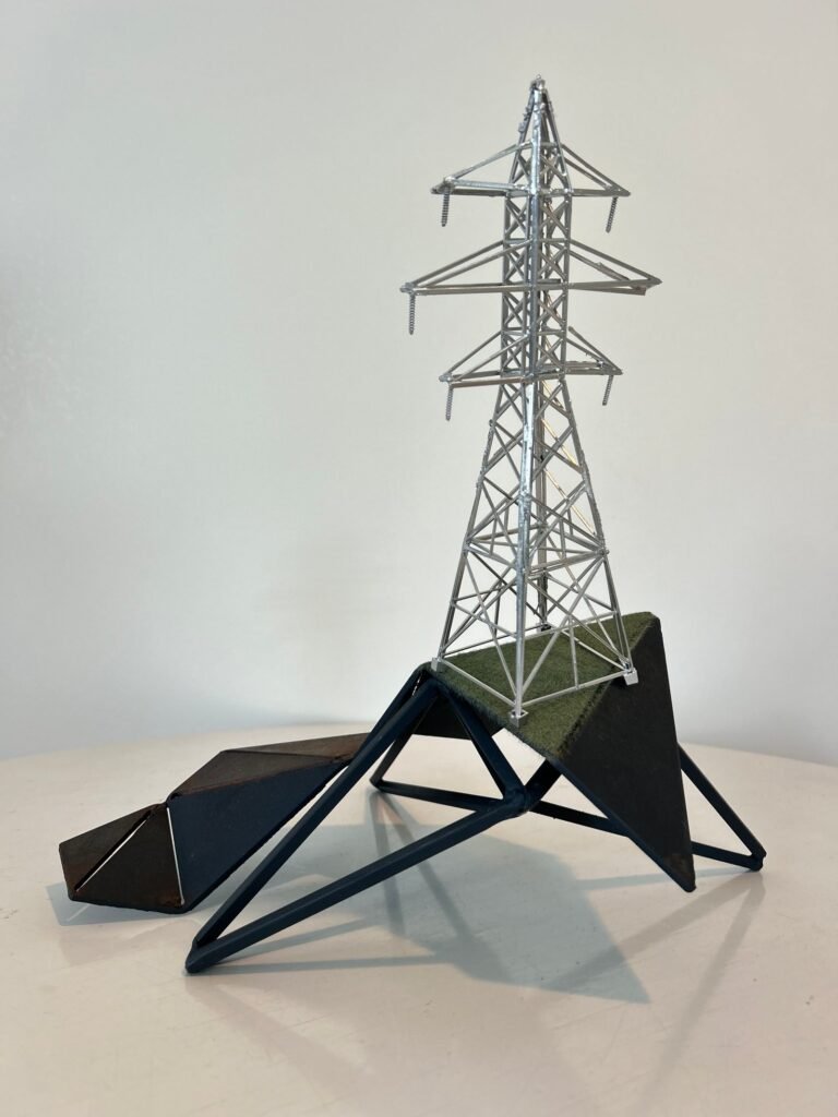 Tower by Jason Brown, metal sculpture depicting an electrical transmission tower on an angular base